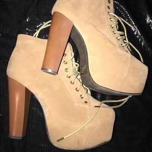 Tan platform heel boot. Lightly worn,